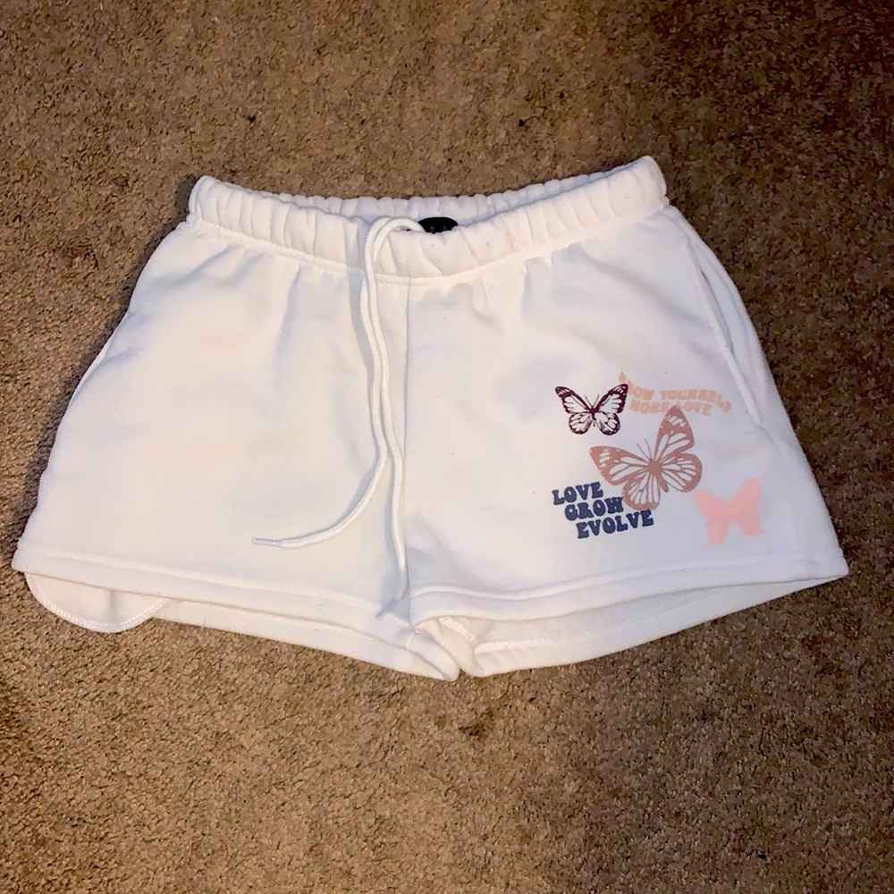 Soft white puffy FADED ROSE shorts
